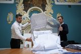 Komise oficiálně potvrdila výsledky voleb v Rusku. Jednotné Rusko má potvrzenou ústavní většinu