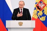 Pompézní Putinův projev v plném sálu. ‚Potřeboval signalizovat, že všichni táhnou za jeden provaz‘