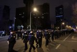 Policie v ulicích i zátarasy. Čína se snaží zabránit novým protestům proti covidovým opatřením