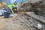 Archeologové při odkrývání hrobů v Jihlavě našli přívěsek pocházející možná až z pozdního středověku