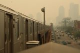 Znečistění ovzduší v USA a Kanadě je rekordně vysoké. Nejhorší je situace v New Yorku a Torontu