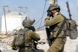Většina lidí u humanitárního konvoje nedaleko Gazy zemřela v tlačenici, tvrdí izraelská armáda