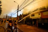 Dobrovolný hasič a lesní úředník. V Chile zadrželi dva muže podezřelé ze založení požáru se 137 oběťmi